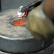 Illustration for article titled Watch a Designer Turn Soda Cans Into Stools on a São Paulo Street